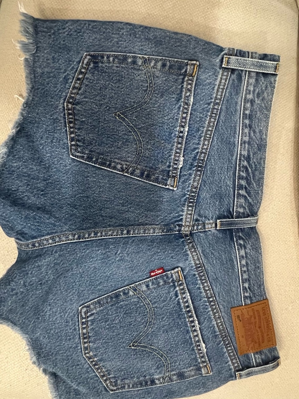 Levi's Medium Blue Denim Cutoff Jeans - women’s Relaxed Fit